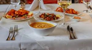 Neatly set dining table in a clean restaurant, illustrating a pest-free and hygienic environment.